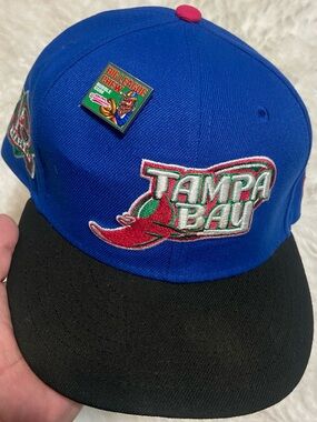 New Era Blue and Black Tampa Bay Snapback with Pink Top Button